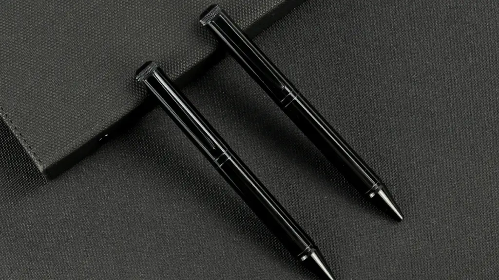 two metal pens