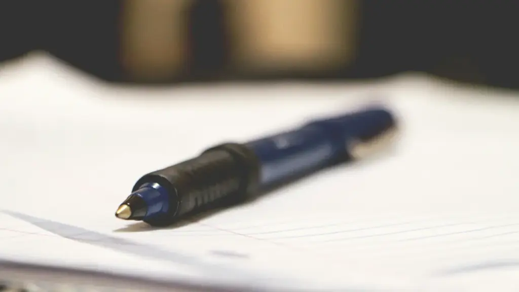 a roller ball pen on the desk