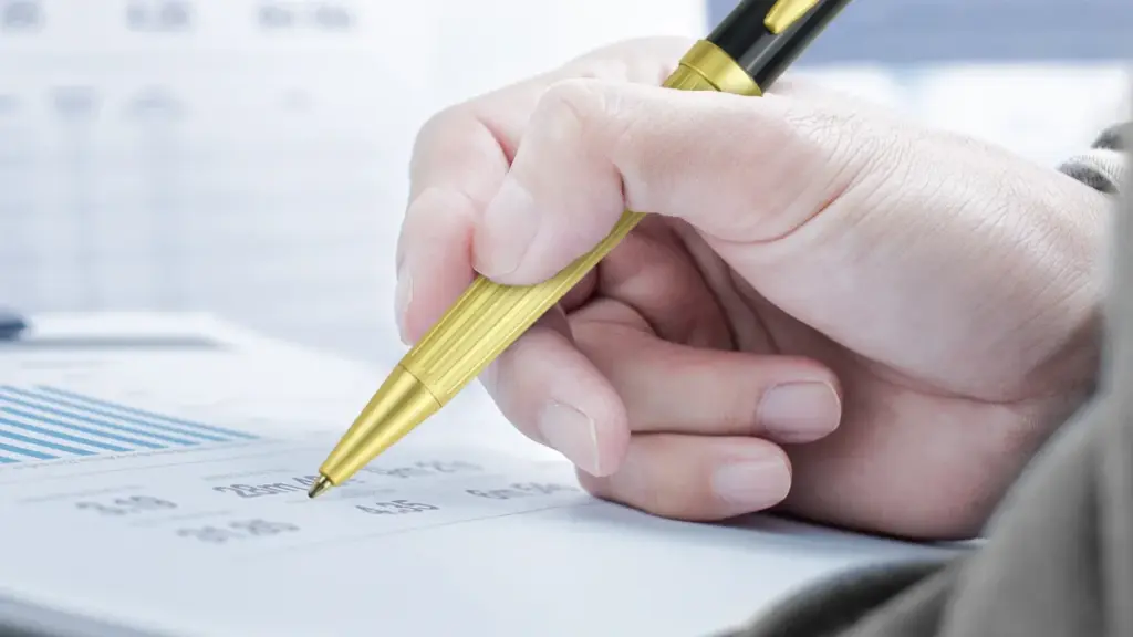 metal fountain pen in hands