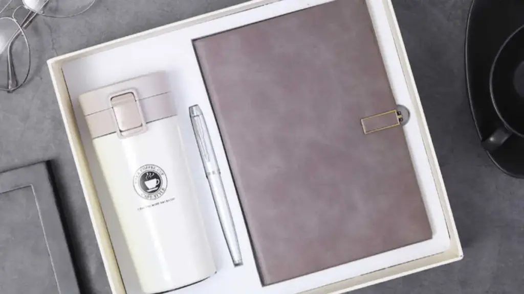 white notebook and pen gift set
