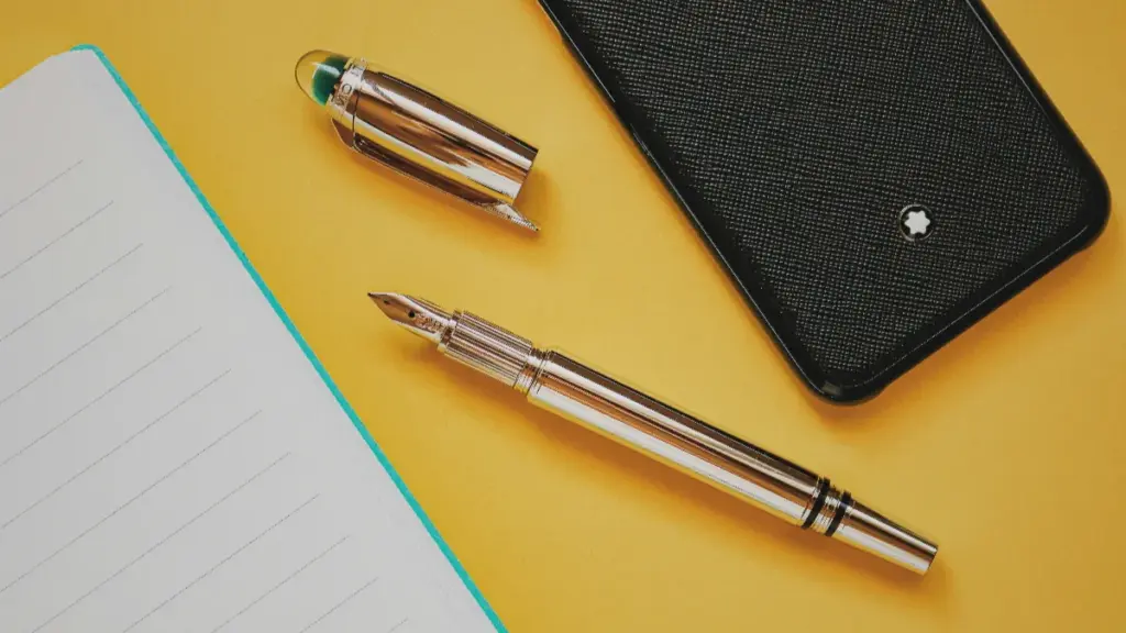 silver metal pen on the desk